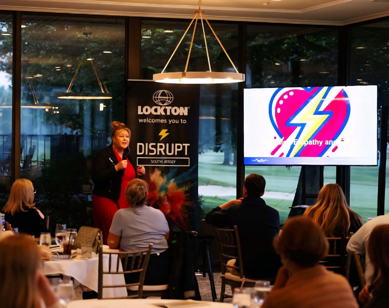 Kristi Straw facilitating a live room for business leaders